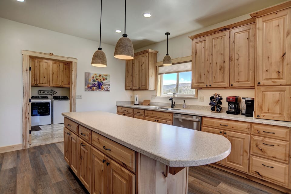 Kitchen - Mountain Aire VRC Rental Home - Our custom-built Amish cabinets, large kitchen island, mountain views from the sink.  Enjoy a drip coffee maker or Keurig.