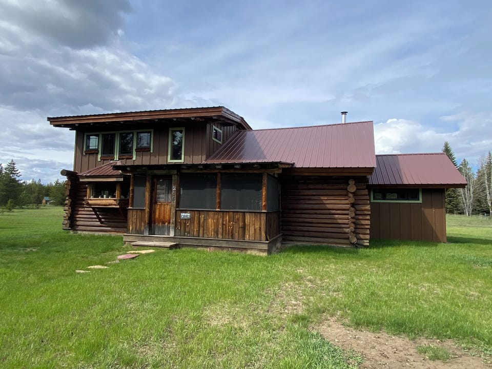 Full view of the cabin from the front yard