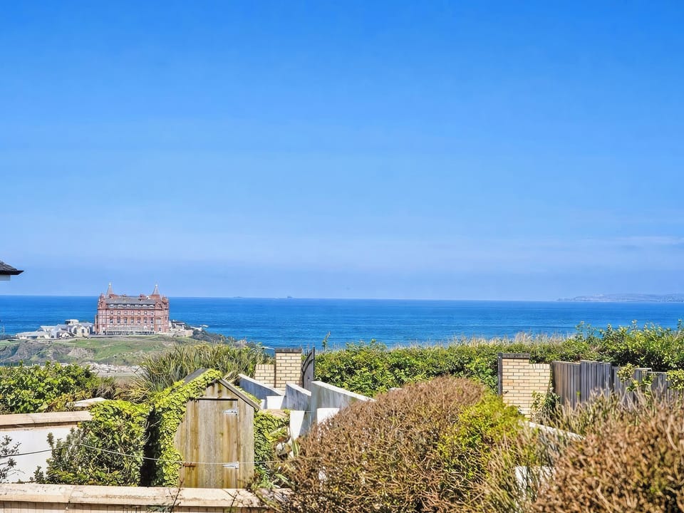 Sea view from elevated hot tub and terrace view of Headland Hotel | Headland Views, Newquay