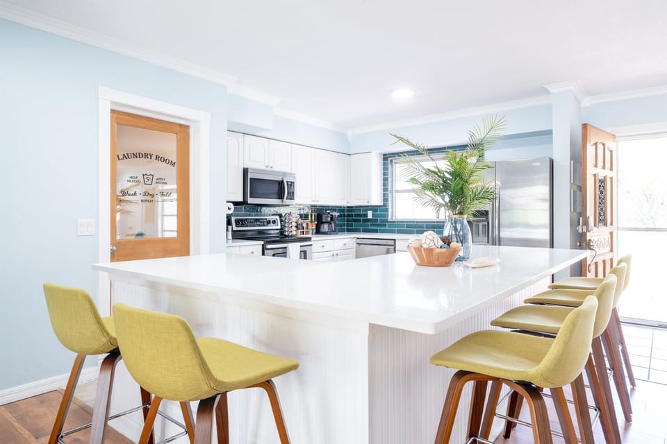 The oversized kitchen island will be the perfect prep and cook space for the chefs in the group