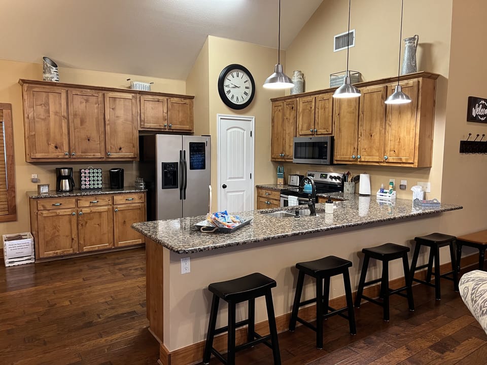 Open kitchen filled with Up-To-Date appliances and cooking needs!