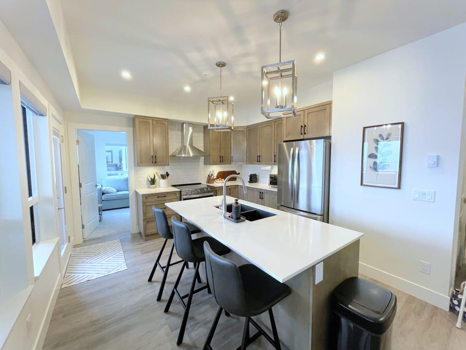 Brand new kitchen with shaker wood cabinets, stone counters and stainless appl.