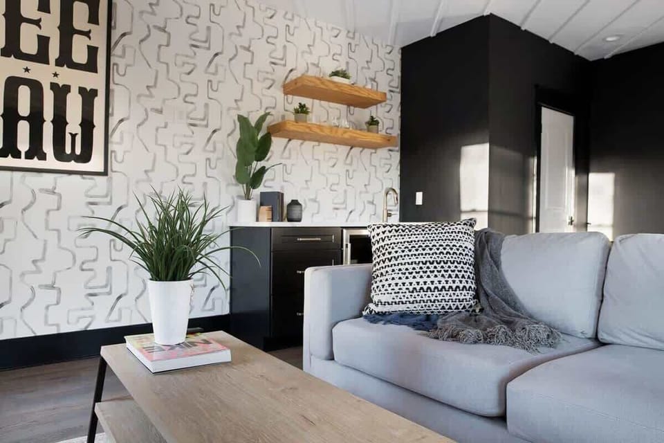 Open-Concept Living Room with Smart TV and Plush Seating