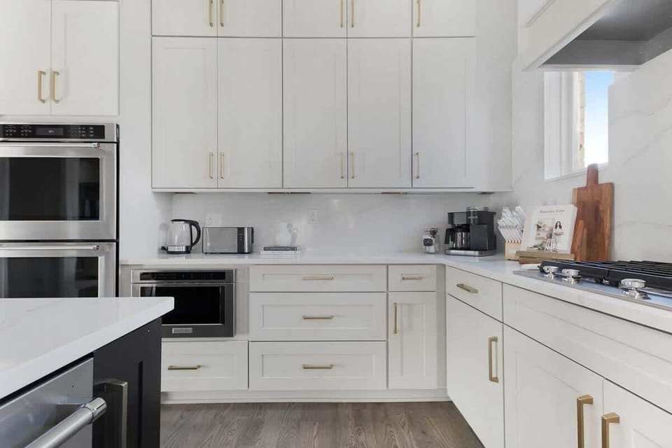 Fully Stocked Kitchen with Modern Appliances and Ample Storage