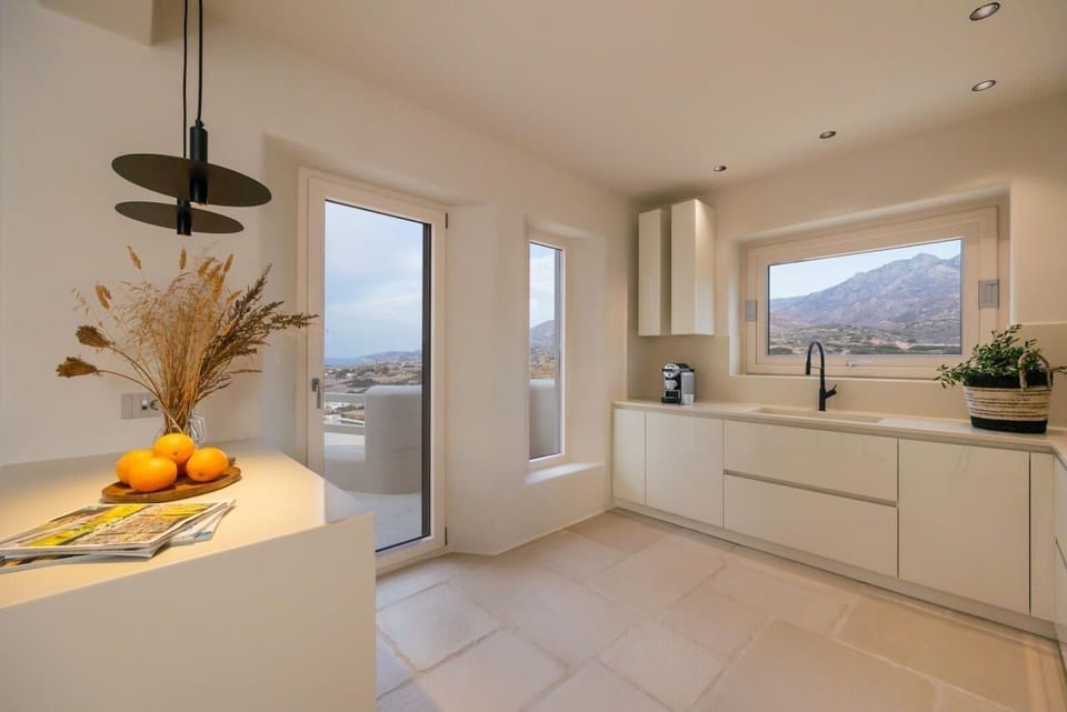 Kitchen with sea and mountain views