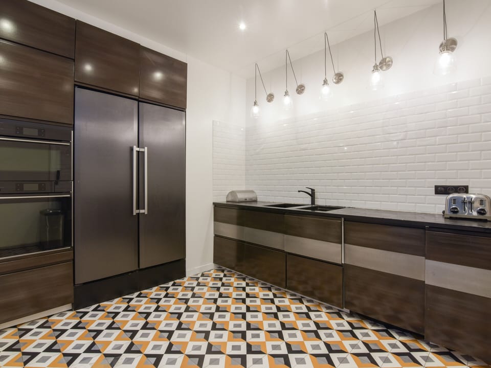 Modern fully stocked kitchen.