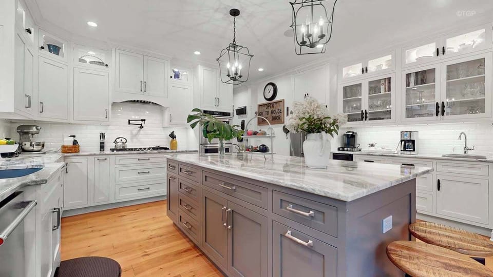 Expansive kitchen island, fully stocked kitchen