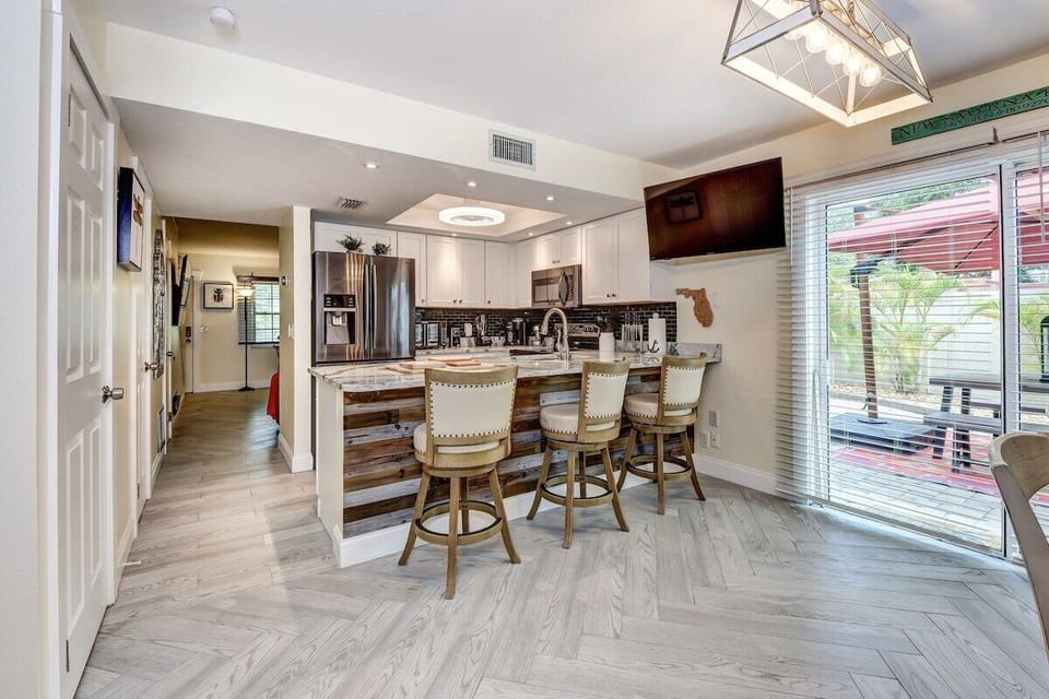 Modern Fully Equipped Kitchen with Bar Seating