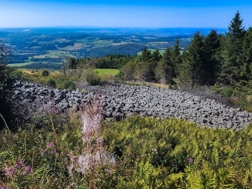 Panoramic view over the sea of basalt blocks on the western slope of the Wasserkuppe