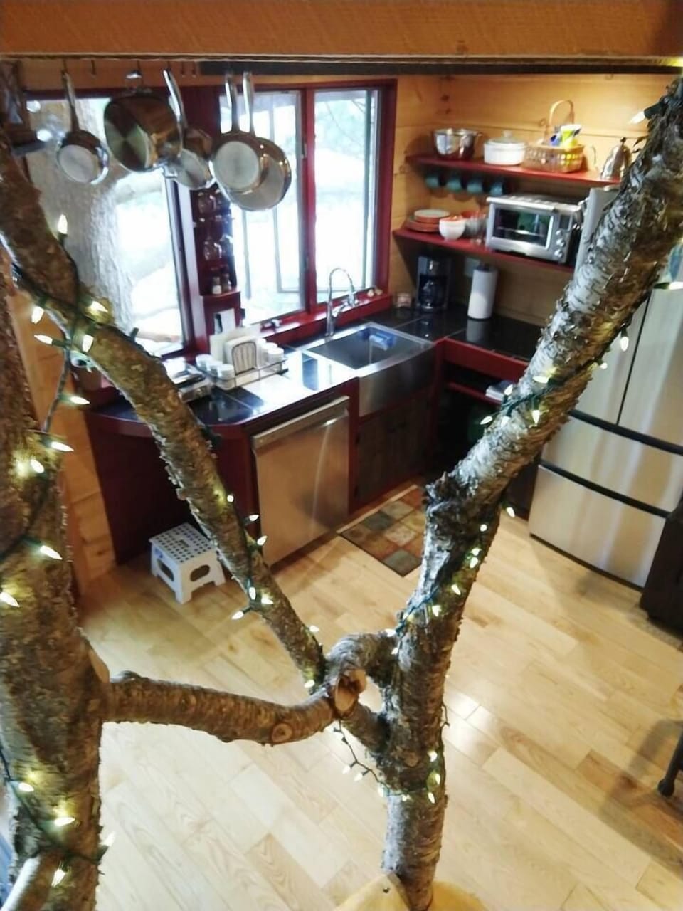 looking down to the kitchen from the upstairs bedroom