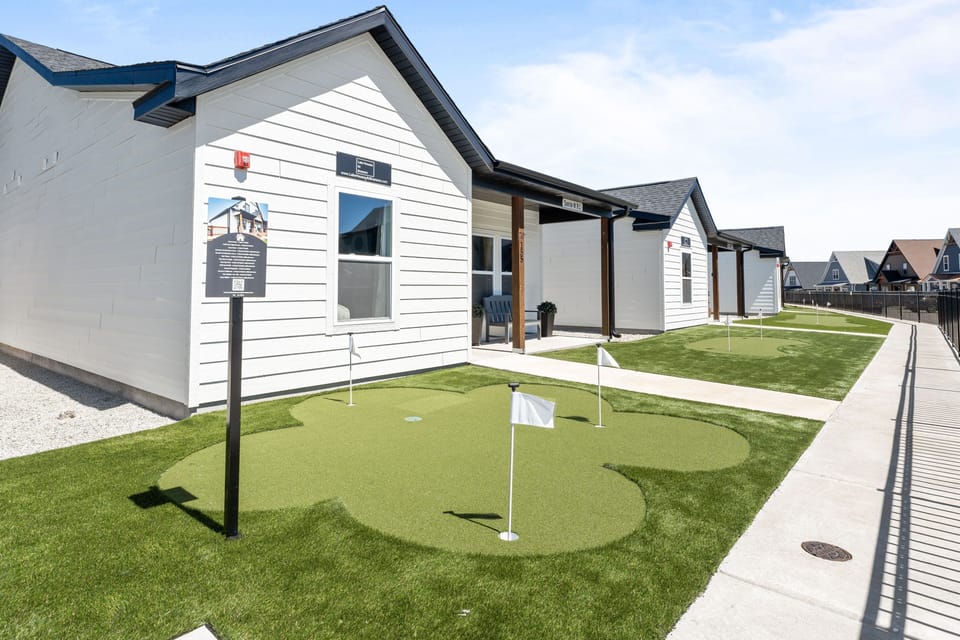 Home Exterior and Putting Greens