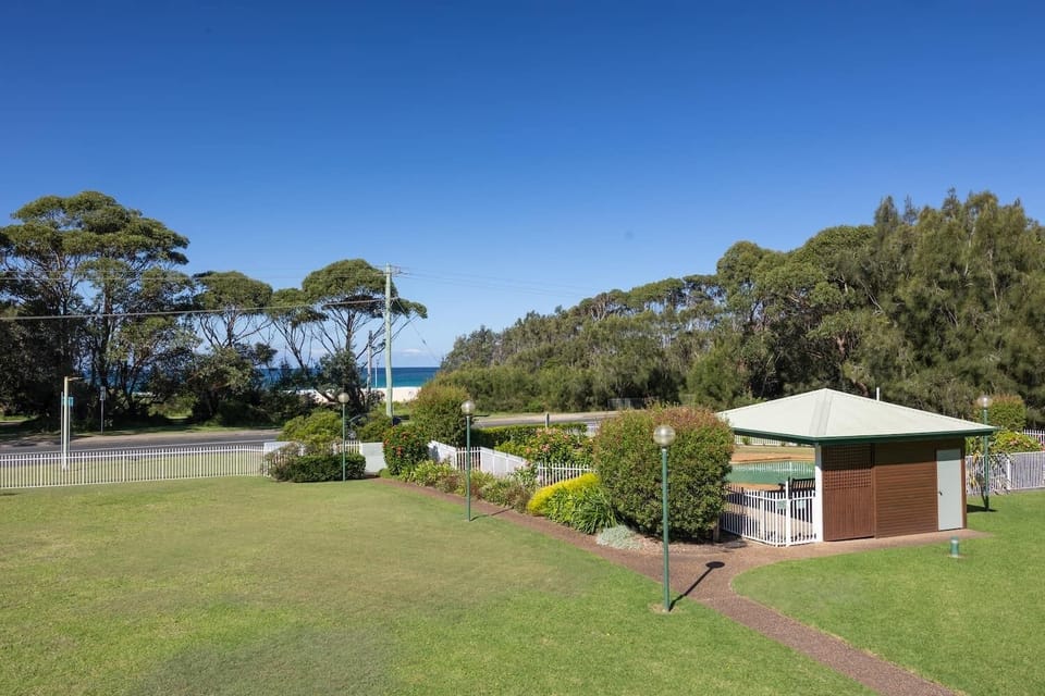Enjoy the view across the lawn to the beach.