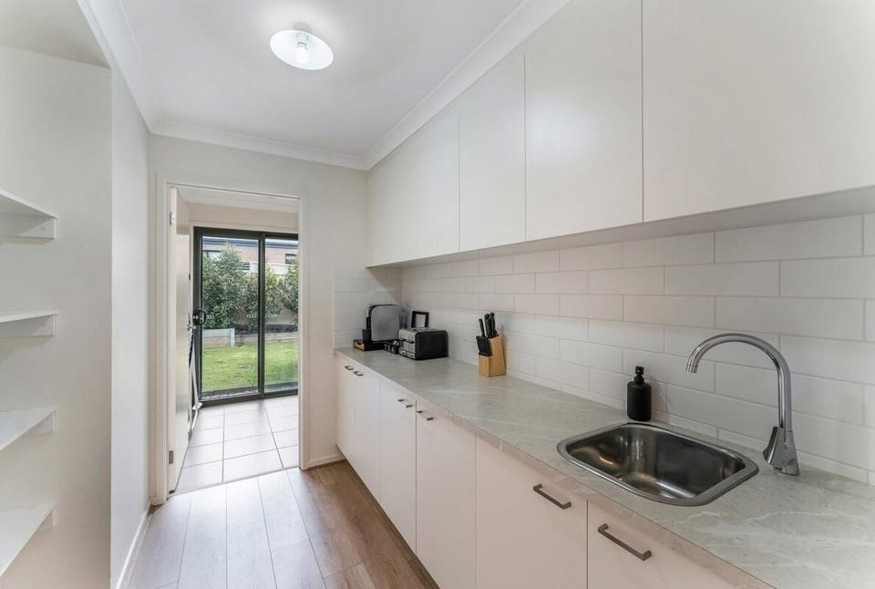 Butlers pantry - a luxurious addition to this beautiful property.