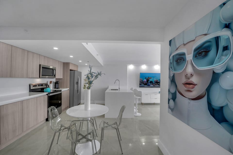 Dining area, fully equipped kitchen, views in living area with Roku streaming Tv