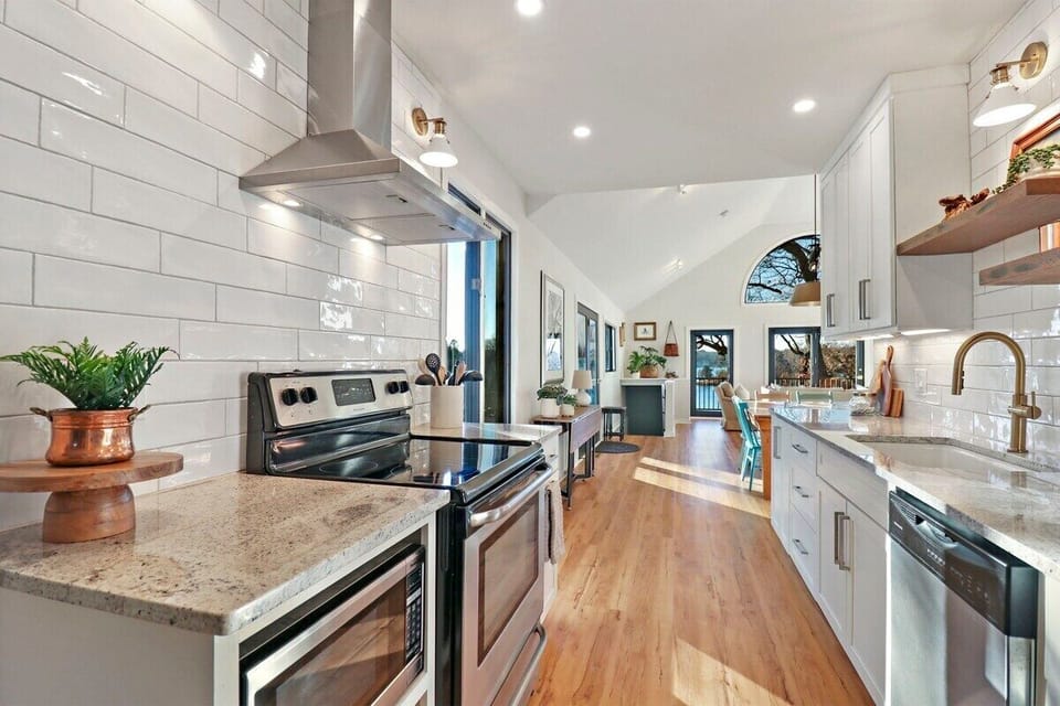 Fully equipped kitchen with electric stove