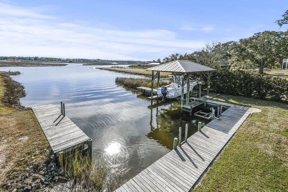 Exterior pool, bayou, and river views.  Private dock for fishing and boating.