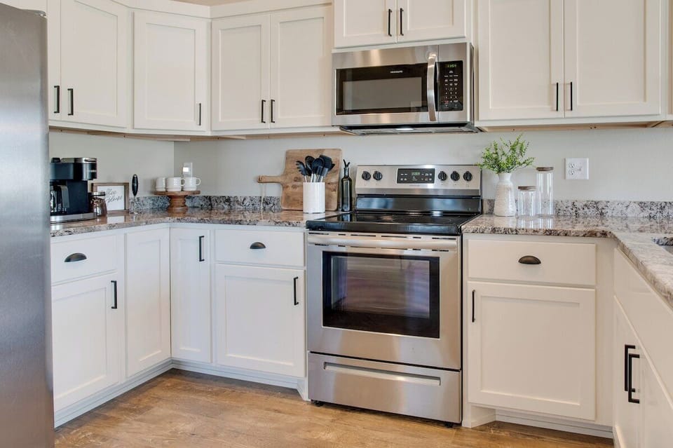 Full equipped kitchen designed to accommodate 8 guests featuring all the essentials for cooking and dining together.