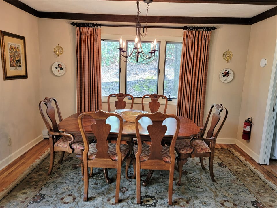More formal eating area off the other end of the kitchen