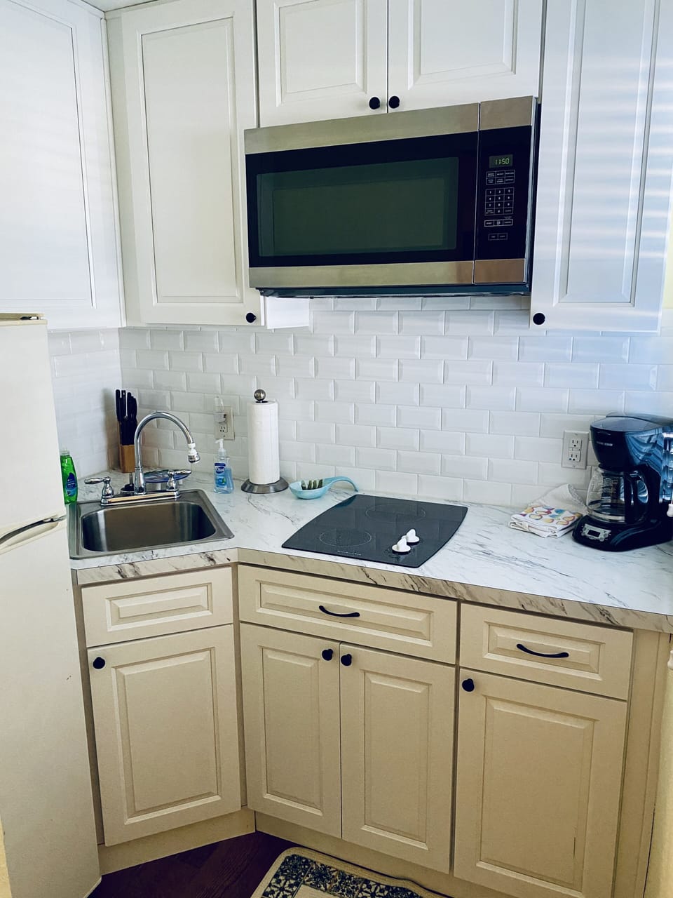 Newly remodeled with two burner stove, microwave, full fridge, and coffee maker.