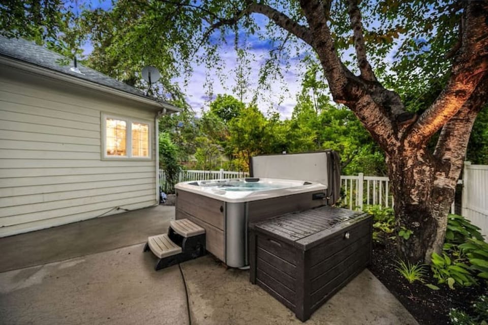 8 person hot tub in private backyard patio