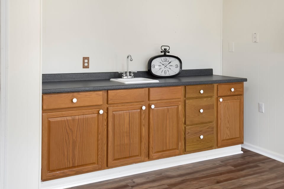 The Queen Bonus Room boasts a wet bar with a sink!
