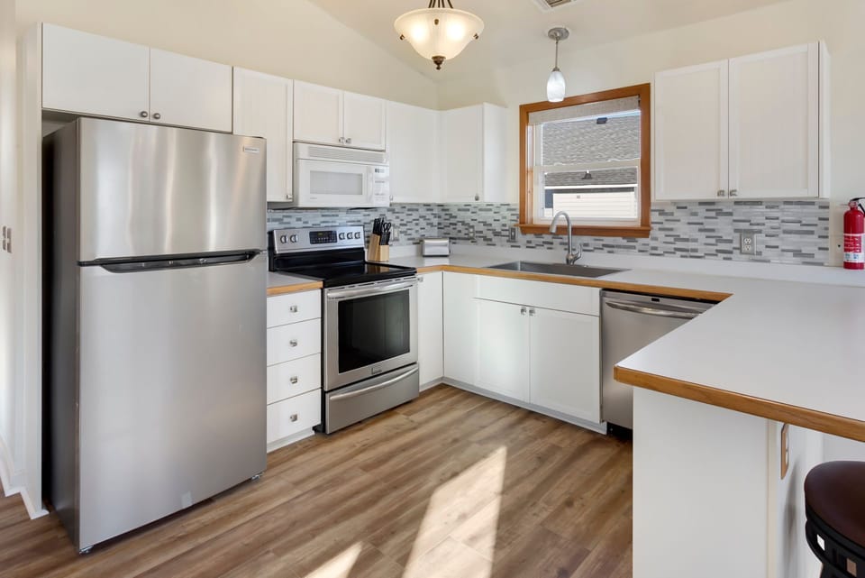 The Top-Level Kitchen offers modern appliances and plenty of prep space.