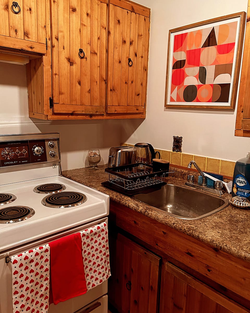 A clean and cozy kitchen with everything you need. 
