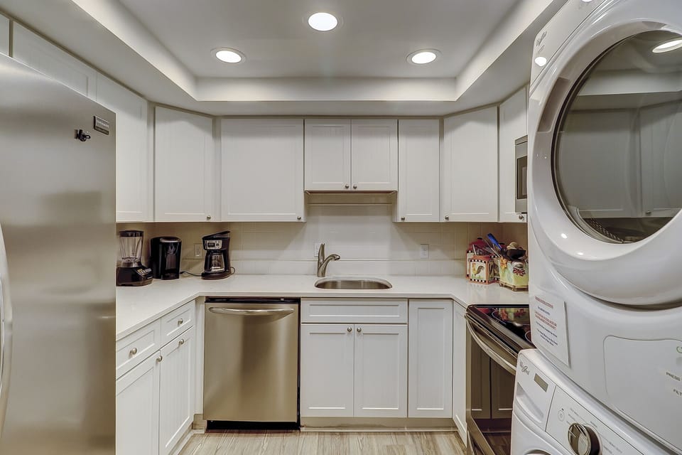 Coffee Pot and Keurig 
Blender
Washer/Dryer off Kitchen