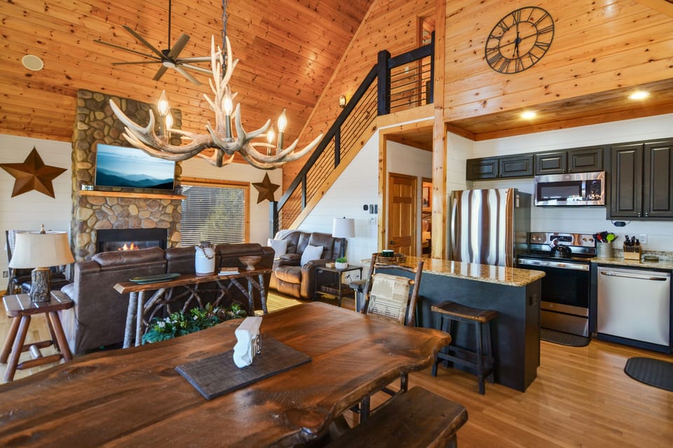 Living room w/ Gas fire place and big screen smart TV w/ Dish TV 