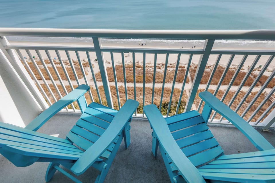 Step onto your private balcony and soak in breathtaking ocean views! Perfect for morning coffee or evening relaxation, this serene space lets you unwind to the sound of waves and the beauty of the beach right at your doorstep.
