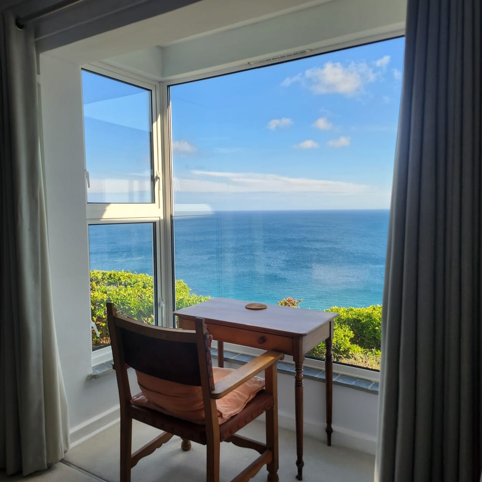 Downstairs super king bedroom with stunning views over the sea