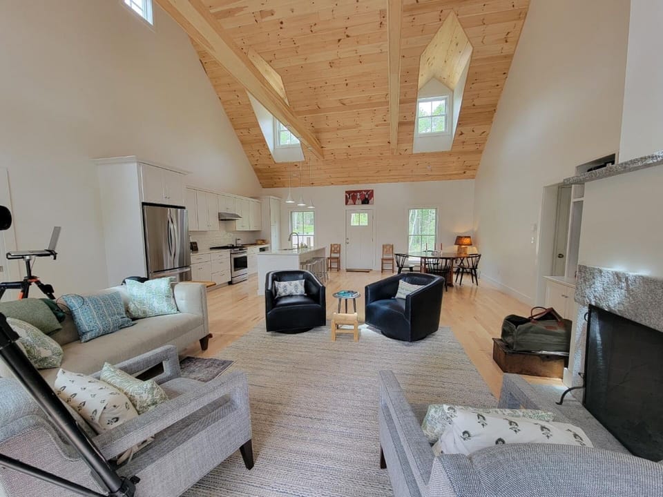 Open concept living room, dining area and kitchen