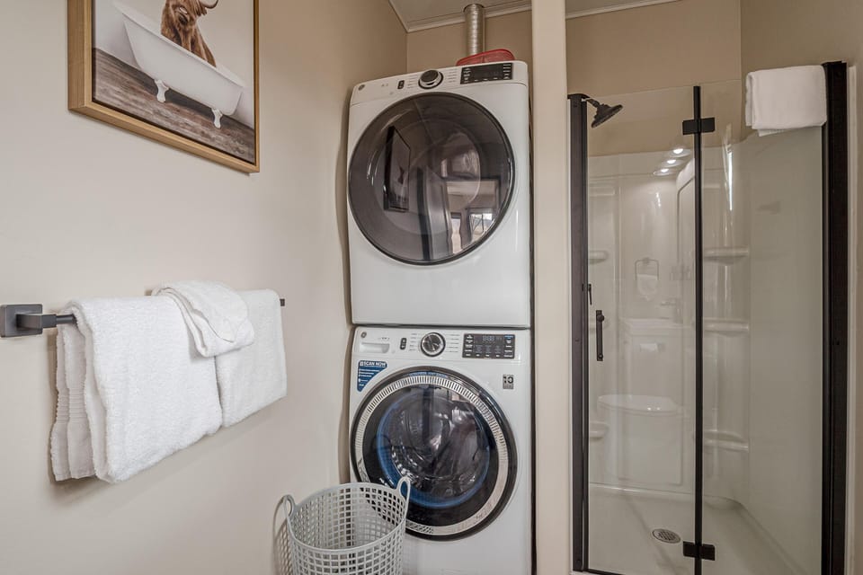 Enjoy the convenience of a full sized washer and dryer located in the bathroom.