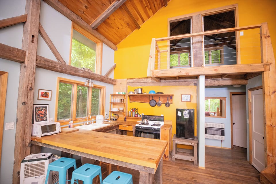 A view of the kitchen and into the hallways.