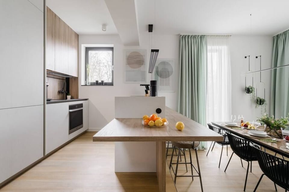 Fully equipped kitchen with microwave, oven, stove, cooking appliances and cooking basics. Dedicated dining area with baby high chair.
