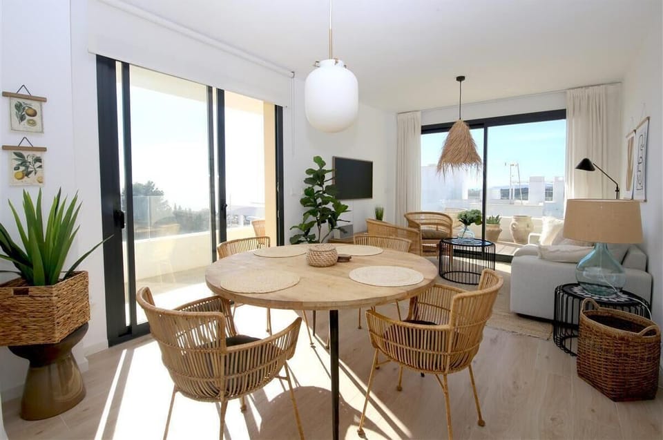 Another view of the modern and stylish lounge with dining area