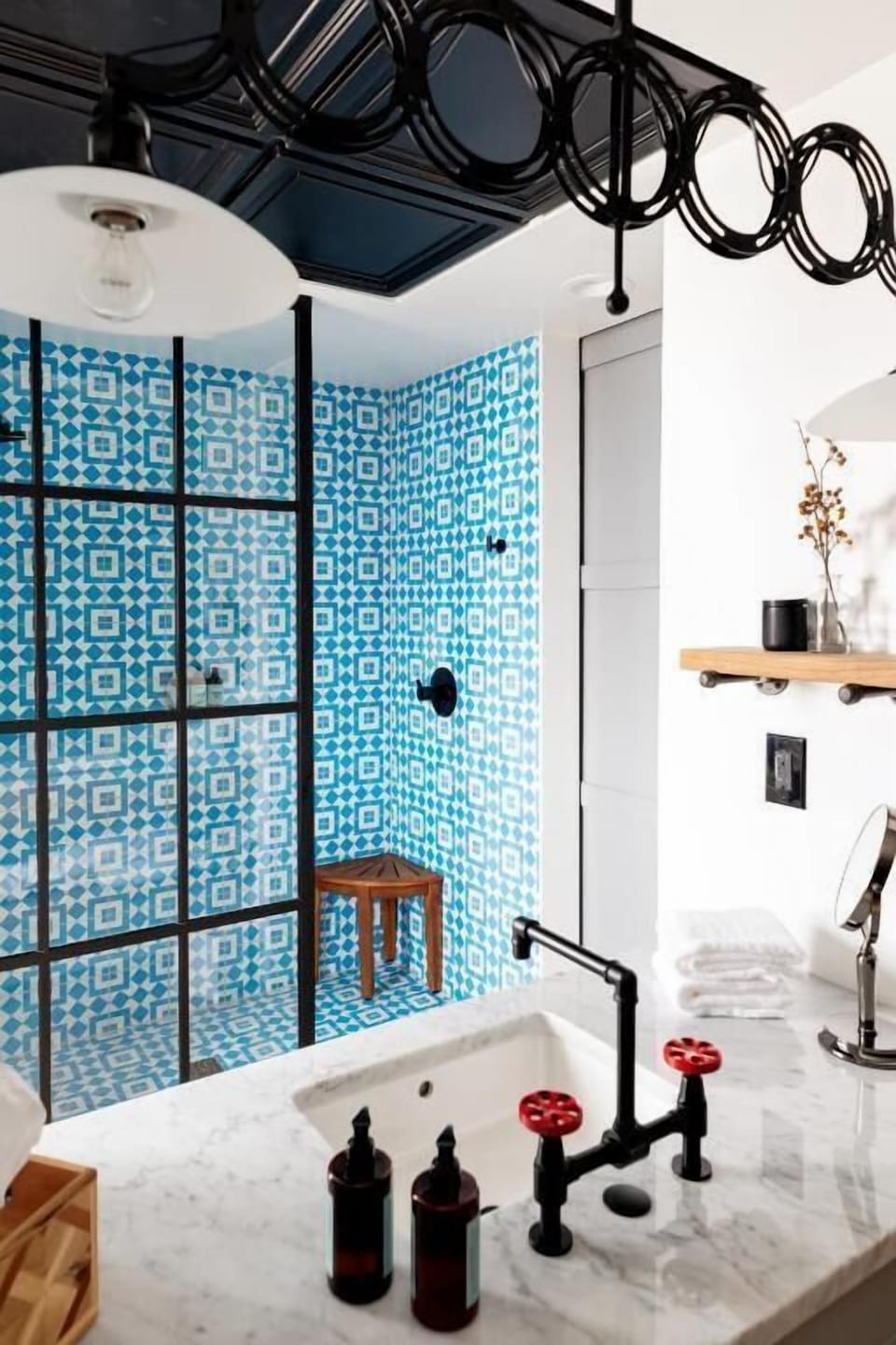 Indulge in a spa-like shower wrapped in bold tile.