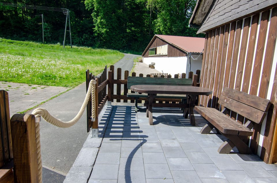 cozy sun terrace with a view of the valley of the Fewo Waldblick