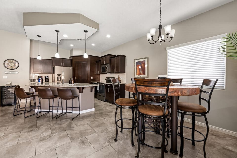 Plenty of seating for your group at the dining table and bar area.