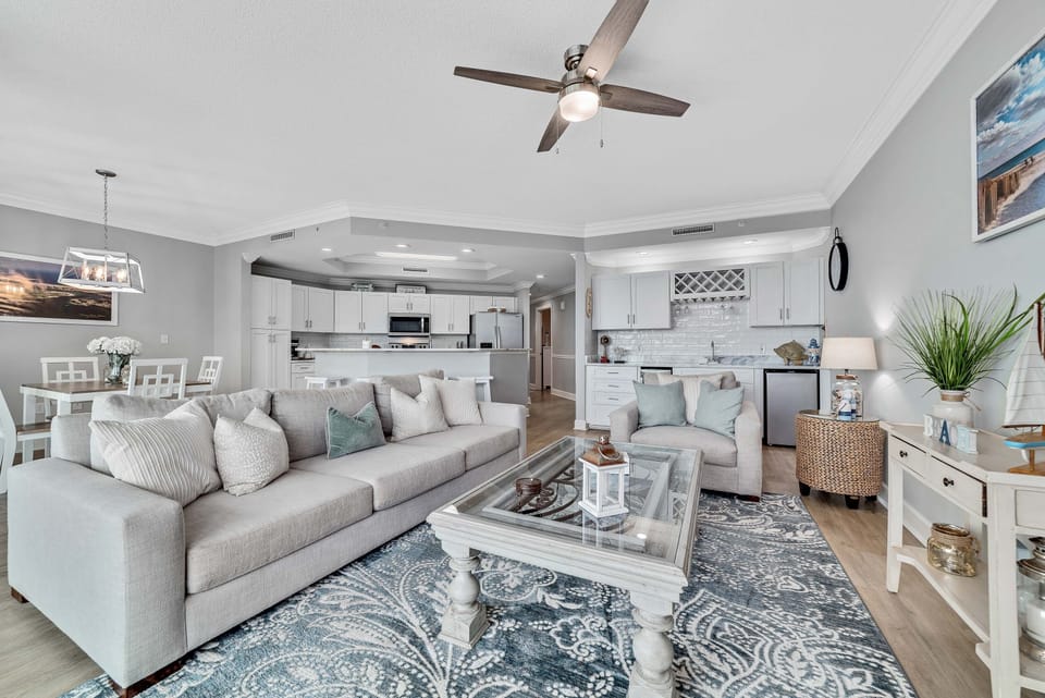 Oversized, plush furniture and upscale decor infuse the space with simple elegance and coastal charm.