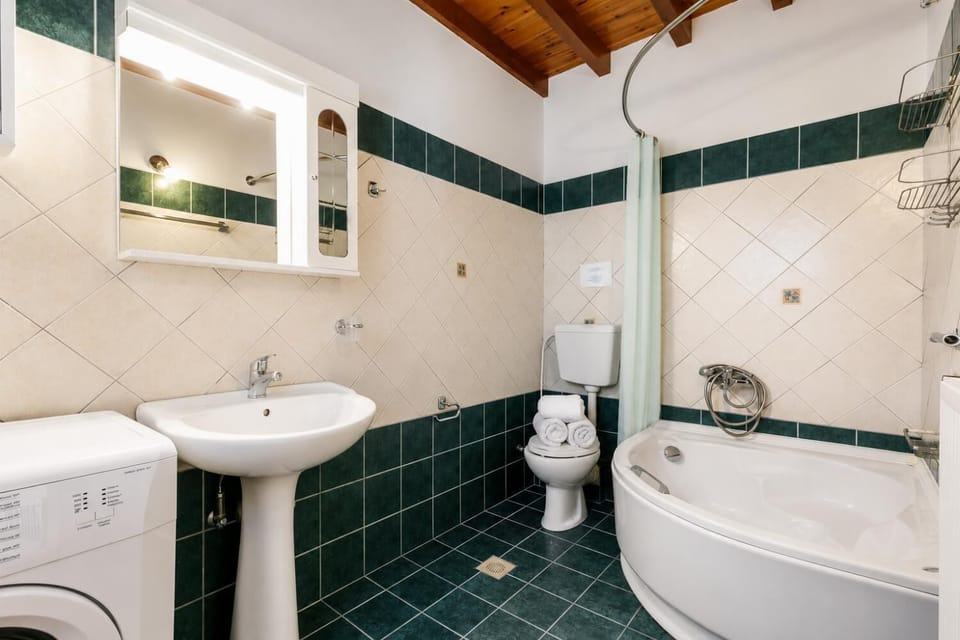 En suite bathroom with bath