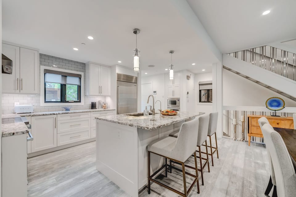 Kitchen island with workspace and bar seating for 3.