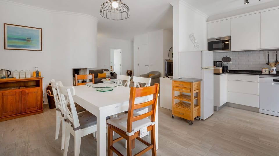Enjoy a warm and delicious meal in this modern and bright dining area that can accommodate up to 6 people #pt #portugal #loule #bright #modern