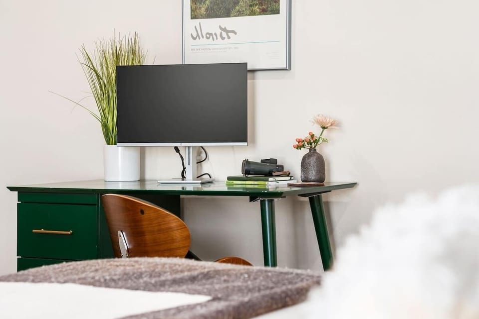 The master bedroom has its own workstation.