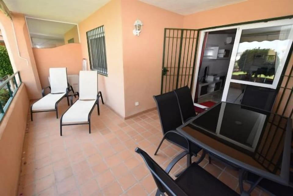 Outside terrace overlooking the pool