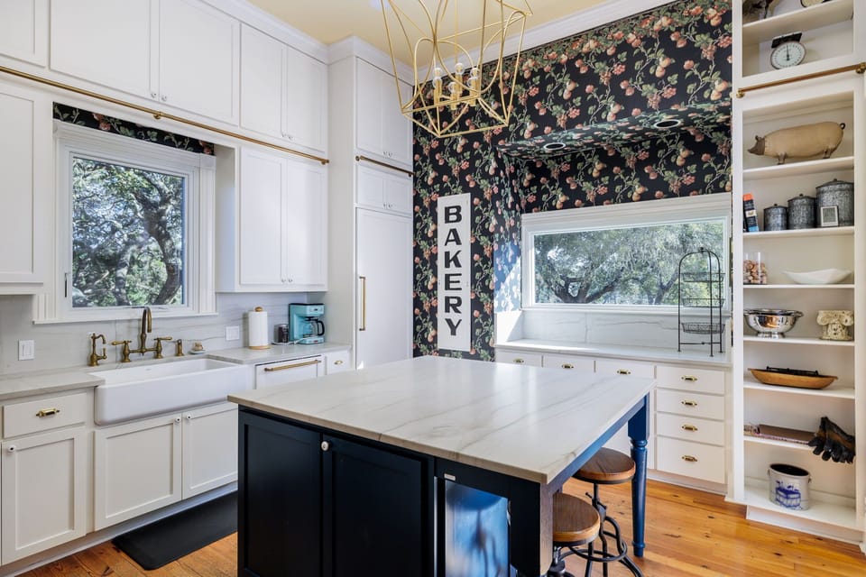Prepare culinary delights in our modern kitchen, equipped with stainless steel appliances and ample counter space