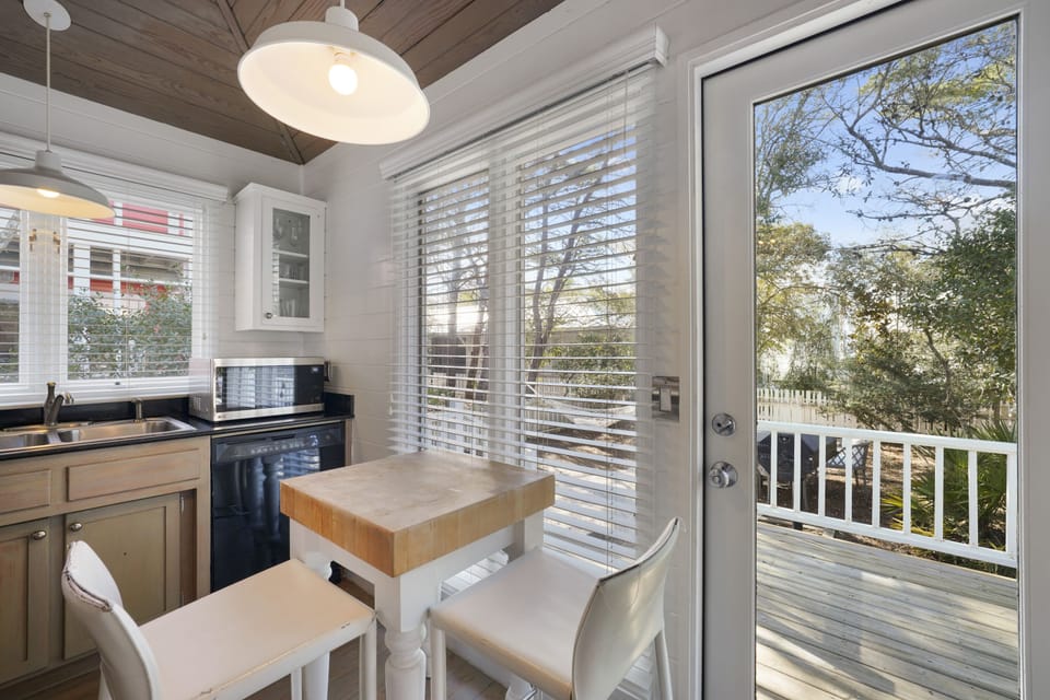 ADDITIONAL DINING SPACE FOR TWO IN KITCHEN NEXT TO OUTDOOR ACCES