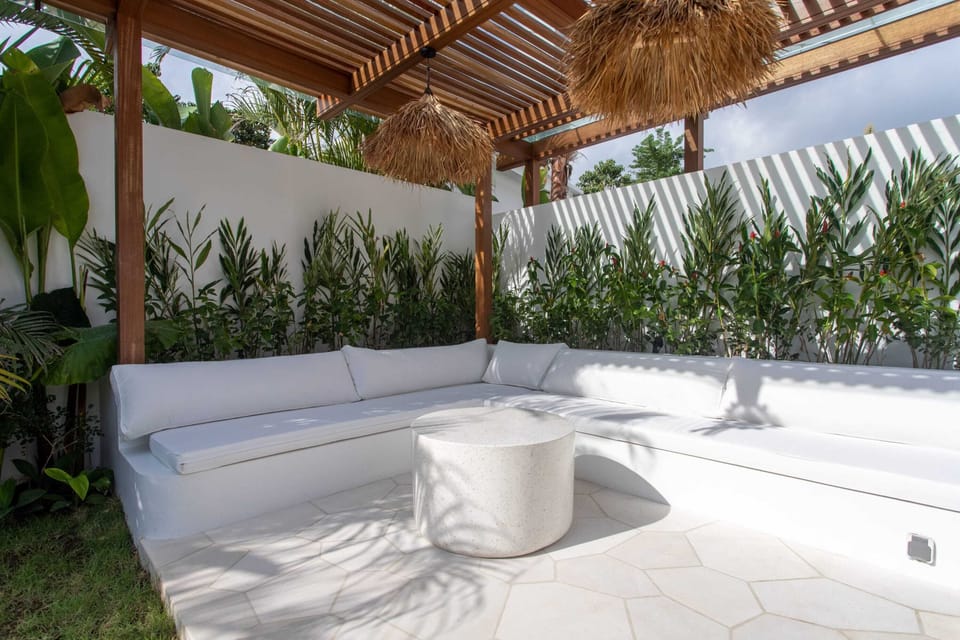 The outdoor lounge next to the pool
