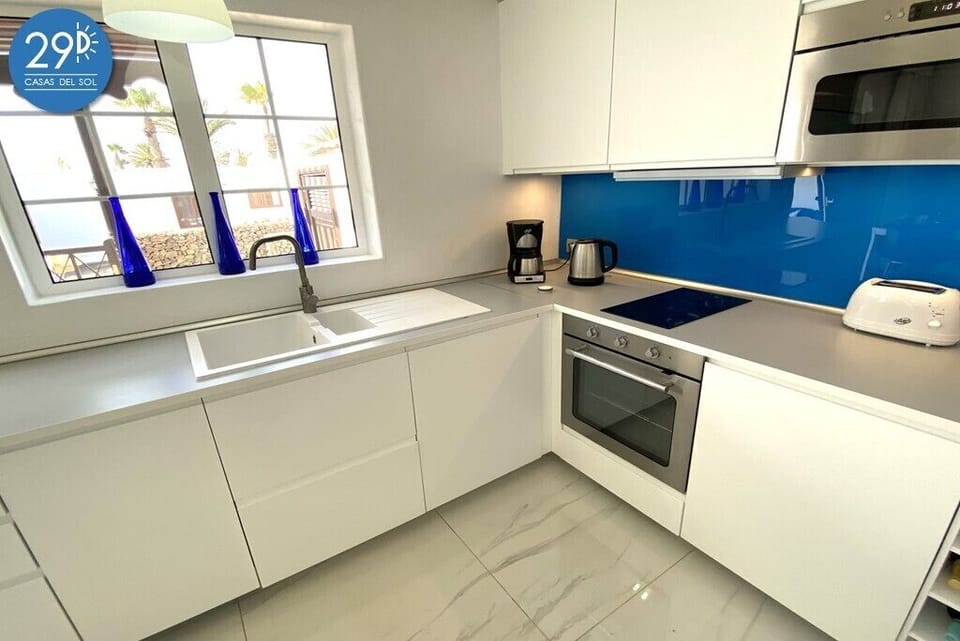 Fitted kitchen including dishwasher, cooker, hob, microwave