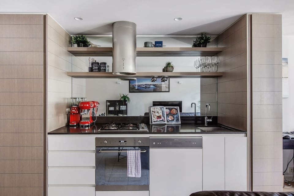 The modern, streamlined kitchen has everything you’ll need to cook meals and a dishwasher for easy clean-up. 
